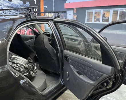 Черный Дэу Ланос, объемом двигателя 1.5 л и пробегом 145 тыс. км за 1799 $, фото 10 на Automoto.ua