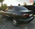Черный Дэу Ланос, объемом двигателя 1.5 л и пробегом 328 тыс. км за 1299 $, фото 1 на Automoto.ua