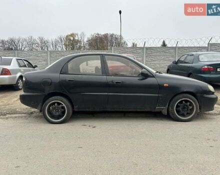 Черный Дэу Ланос, объемом двигателя 1.5 л и пробегом 225 тыс. км за 1200 $, фото 3 на Automoto.ua