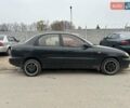 Черный Дэу Ланос, объемом двигателя 1.5 л и пробегом 225 тыс. км за 1200 $, фото 3 на Automoto.ua