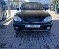 Черный Дэу Ланос, объемом двигателя 1.5 л и пробегом 254 тыс. км за 1200 $, фото 1 на Automoto.ua