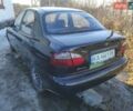 Черный Дэу Ланос, объемом двигателя 1.5 л и пробегом 237 тыс. км за 1850 $, фото 1 на Automoto.ua