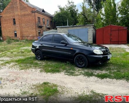 Черный Дэу Ланос, объемом двигателя 1.5 л и пробегом 250 тыс. км за 1400 $, фото 2 на Automoto.ua