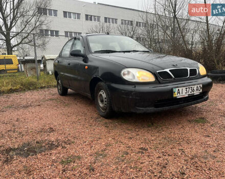 Черный Дэу Ланос, объемом двигателя 1.5 л и пробегом 298 тыс. км за 1000 $, фото 1 на Automoto.ua