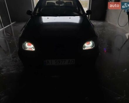 Черный Дэу Ланос, объемом двигателя 1.5 л и пробегом 208 тыс. км за 3000 $, фото 1 на Automoto.ua