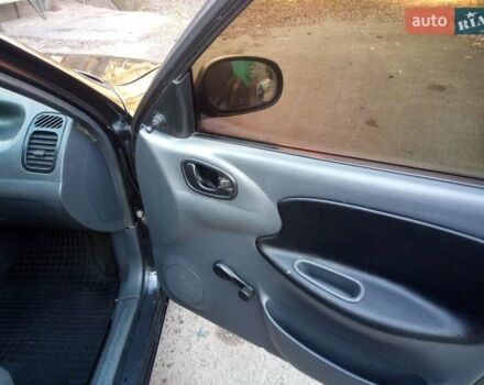 Черный Дэу Ланос, объемом двигателя 1.5 л и пробегом 231 тыс. км за 1999 $, фото 10 на Automoto.ua