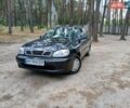 Чорний Деу Ланос, об'ємом двигуна 1.3 л та пробігом 300 тис. км за 900 $, фото 1 на Automoto.ua