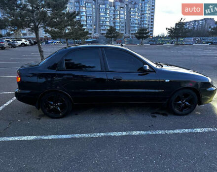 Черный Дэу Ланос, объемом двигателя 1.5 л и пробегом 220 тыс. км за 3100 $, фото 31 на Automoto.ua