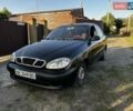 Черный Дэу Ланос, объемом двигателя 1.5 л и пробегом 328 тыс. км за 2300 $, фото 1 на Automoto.ua