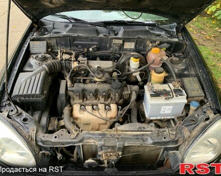 Черный Дэу Ланос, объемом двигателя 1.5 л и пробегом 256 тыс. км за 2600 $, фото 11 на Automoto.ua