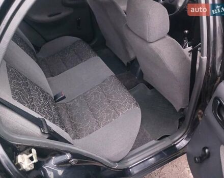 Черный Дэу Ланос, объемом двигателя 1.35 л и пробегом 122 тыс. км за 1699 $, фото 7 на Automoto.ua