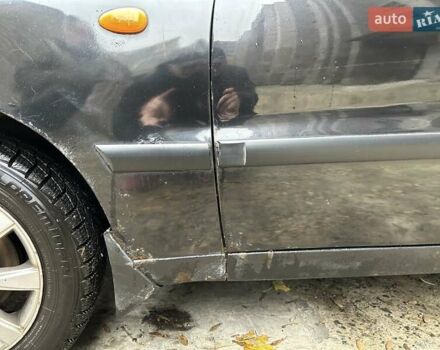 Чорний Деу Ланос, об'ємом двигуна 1.5 л та пробігом 222 тис. км за 1800 $, фото 13 на Automoto.ua