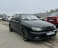 Черный Дэу Ланос, объемом двигателя 1.5 л и пробегом 225 тыс. км за 1200 $, фото 1 на Automoto.ua