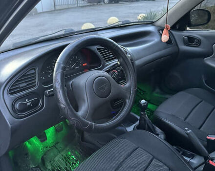 Черный Дэу Ланос, объемом двигателя 1.5 л и пробегом 270 тыс. км за 1900 $, фото 14 на Automoto.ua