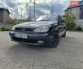 Черный Дэу Ланос, объемом двигателя 1.5 л и пробегом 216 тыс. км за 1500 $, фото 1 на Automoto.ua