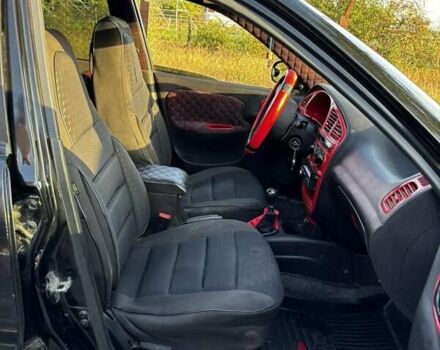 Деу Ланос 2006 у Новомосковске на Automoto.ua Чорний Деу Ланос, об'ємом двигуна 1.5 л та пробігом 328 тис. км за 1800 $, фото 4 на Automoto.ua