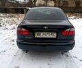 Чорний Деу Ланос, об'ємом двигуна 1.5 л та пробігом 100 тис. км за 1500 $, фото 1 на Automoto.ua