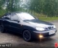 Черный Дэу Ланос, объемом двигателя 1.5 л и пробегом 216 тыс. км за 2700 $, фото 2 на Automoto.ua