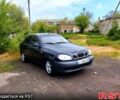 Черный Дэу Ланос, объемом двигателя 1.5 л и пробегом 275 тыс. км за 1000 $, фото 1 на Automoto.ua
