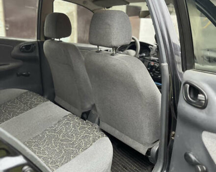 Черный Дэу Ланос, объемом двигателя 1.5 л и пробегом 140 тыс. км за 2500 $, фото 23 на Automoto.ua