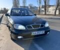 Чорний Деу Ланос, об'ємом двигуна 1.6 л та пробігом 165 тис. км за 2200 $, фото 1 на Automoto.ua