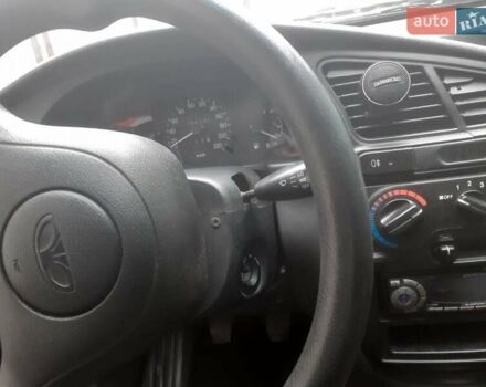 Черный Дэу Ланос, объемом двигателя 1.5 л и пробегом 94 тыс. км за 2800 $, фото 5 на Automoto.ua