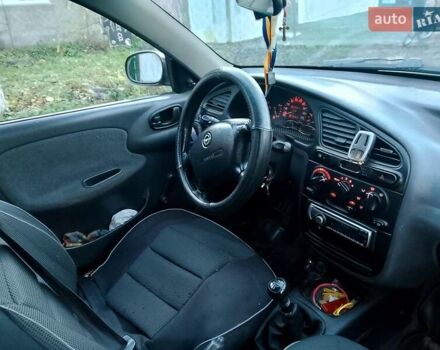 Черный Дэу Ланос, объемом двигателя 1.5 л и пробегом 256 тыс. км за 1850 $, фото 5 на Automoto.ua
