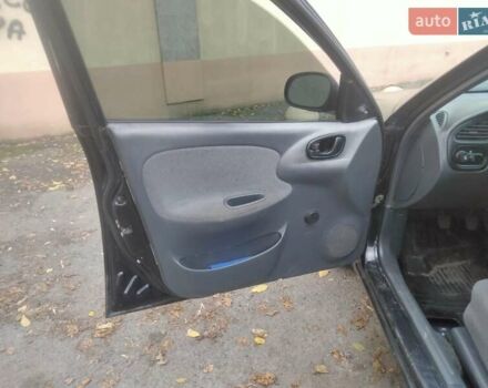 Черный Дэу Ланос, объемом двигателя 1.5 л и пробегом 200 тыс. км за 1550 $, фото 9 на Automoto.ua