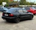 Чорний Деу Ланос, об'ємом двигуна 1.5 л та пробігом 200 тис. км за 850 $, фото 1 на Automoto.ua