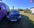 Чорний Деу Ланос, об'ємом двигуна 1.5 л та пробігом 222 тис. км за 1801 $, фото 1 на Automoto.ua