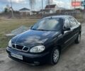 Черный Дэу Ланос, объемом двигателя 1.5 л и пробегом 308 тыс. км за 2300 $, фото 1 на Automoto.ua