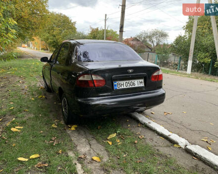 Черный Дэу Ланос, объемом двигателя 1.5 л и пробегом 263 тыс. км за 1830 $, фото 2 на Automoto.ua
