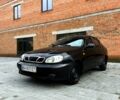 Черный Дэу Ланос, объемом двигателя 1.5 л и пробегом 280 тыс. км за 1450 $, фото 1 на Automoto.ua