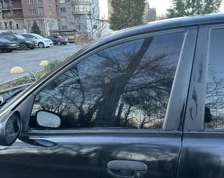 Черный Дэу Ланос, объемом двигателя 1.5 л и пробегом 270 тыс. км за 1900 $, фото 9 на Automoto.ua