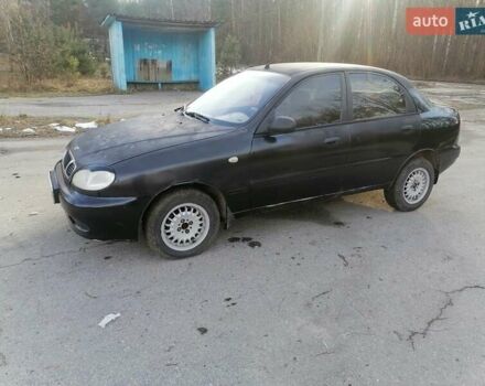 Черный Дэу Ланос, объемом двигателя 1.5 л и пробегом 300 тыс. км за 1650 $, фото 1 на Automoto.ua