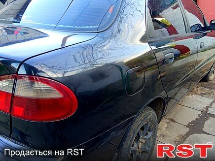 Черный Дэу Ланос, объемом двигателя 1.5 л и пробегом 0 тыс. км за 1400 $, фото 1 на Automoto.ua