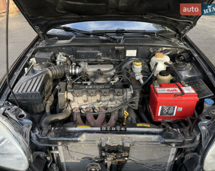 Черный Дэу Ланос, объемом двигателя 1.5 л и пробегом 198 тыс. км за 2199 $, фото 13 на Automoto.ua