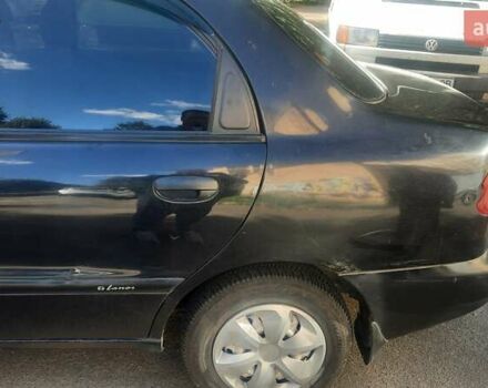 Черный Дэу Ланос, объемом двигателя 1.5 л и пробегом 110 тыс. км за 1500 $, фото 8 на Automoto.ua