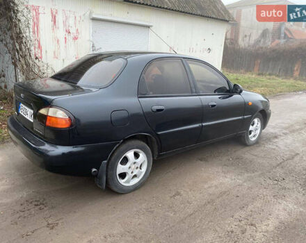 Черный Дэу Ланос, объемом двигателя 1.5 л и пробегом 231 тыс. км за 1750 $, фото 2 на Automoto.ua