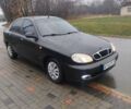 Черный Дэу Ланос, объемом двигателя 1.5 л и пробегом 200 тыс. км за 2150 $, фото 2 на Automoto.ua