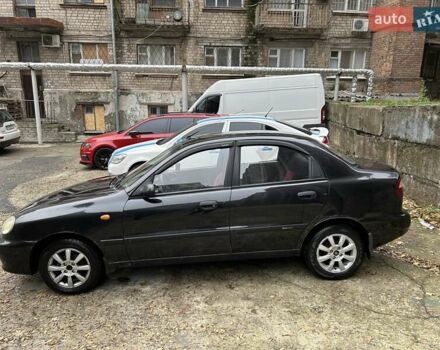 Чорний Деу Ланос, об'ємом двигуна 1.5 л та пробігом 222 тис. км за 1800 $, фото 3 на Automoto.ua