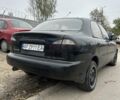 Черный Дэу Ланос, объемом двигателя 1.5 л и пробегом 225 тыс. км за 1200 $, фото 4 на Automoto.ua