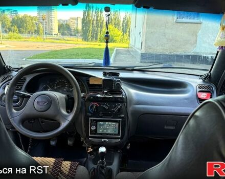 Чорний Деу Ланос, об'ємом двигуна 1.5 л та пробігом 0 тис. км за 2000 $, фото 8 на Automoto.ua