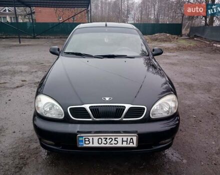Черный Дэу Ланос, объемом двигателя 1.35 л и пробегом 122 тыс. км за 1699 $, фото 1 на Automoto.ua