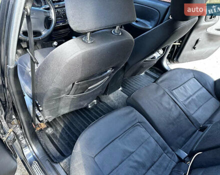 Черный Дэу Ланос, объемом двигателя 1.5 л и пробегом 220 тыс. км за 3100 $, фото 17 на Automoto.ua
