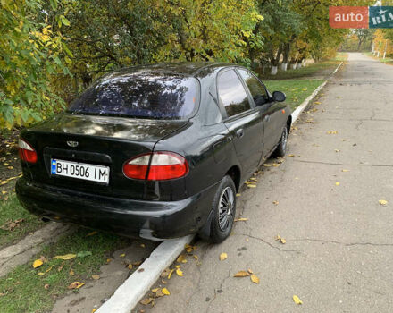 Черный Дэу Ланос, объемом двигателя 1.5 л и пробегом 263 тыс. км за 1830 $, фото 3 на Automoto.ua