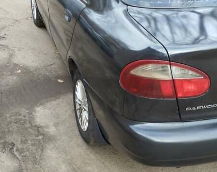 Черный Дэу Ланос, объемом двигателя 1.5 л и пробегом 244 тыс. км за 1650 $, фото 3 на Automoto.ua