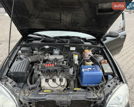 Черный Дэу Ланос, объемом двигателя 1.5 л и пробегом 251 тыс. км за 2550 $, фото 11 на Automoto.ua