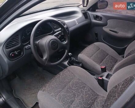 Черный Дэу Ланос, объемом двигателя 1.35 л и пробегом 122 тыс. км за 1699 $, фото 6 на Automoto.ua