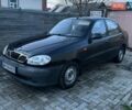Черный Дэу Ланос, объемом двигателя 1.5 л и пробегом 233 тыс. км за 1900 $, фото 1 на Automoto.ua